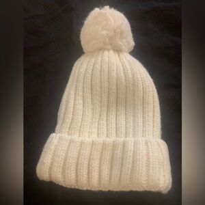 Three different beanies sold as bundle with cozy ribbed design.  $9 for all 3